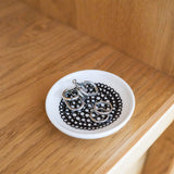 アクセサリーの乗った豆皿